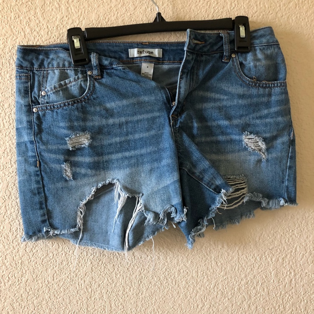 Blue jean shorts with rips